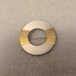 Vintage circular Napier brooch with silver and gold tone